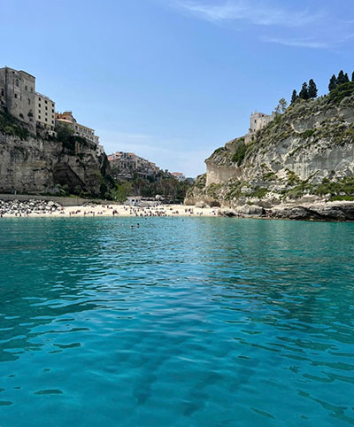 View of Tropea coastline from the sea during boat excursion
