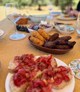 Cooking traditional Calabrian dishes during class in Tropea