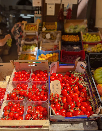 Walking through Tropea’s old town with traditional streets and local shops
