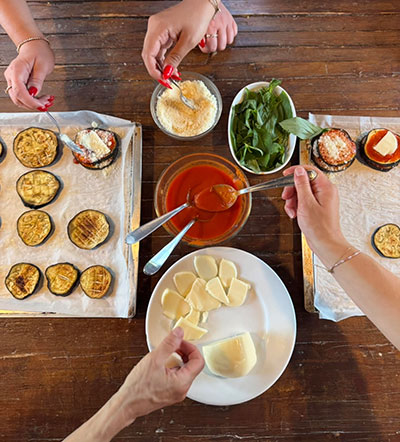 Preparing local ingredients during hands-on cooking experience in Calabria