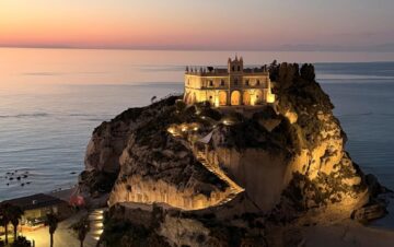 Photo A: Tropea historic centre overlooking the Tyrrhenian Sea in Southern Calabria, Italy at sunset.